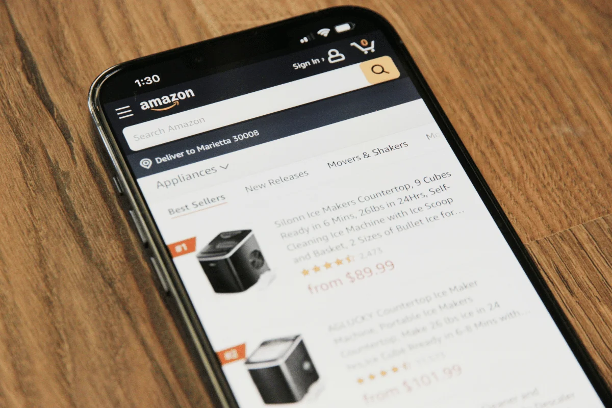 Mobile phone displaying Amazon's appliance section with ice makers for sale.