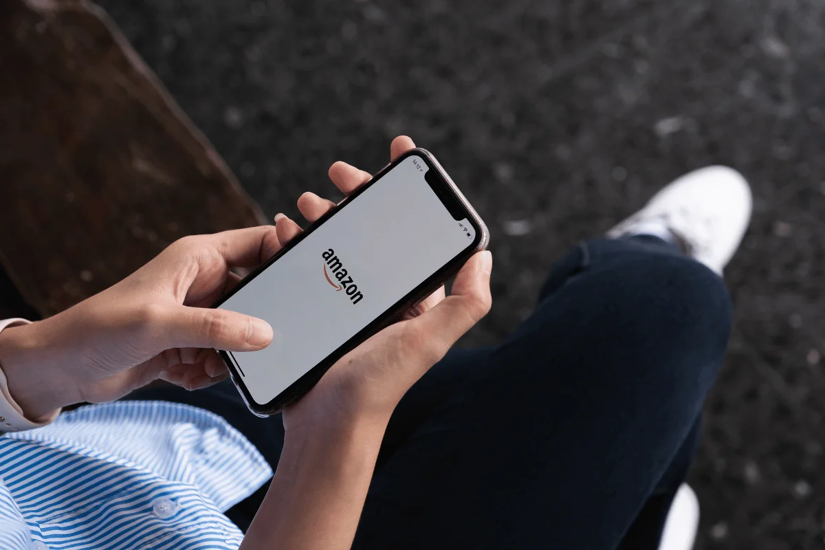 User accessing Amazon app on their smartphone.